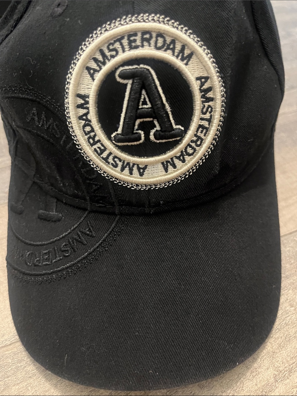 Robin Ruth Black Baseball Cap with Cream Amsterdam Patch